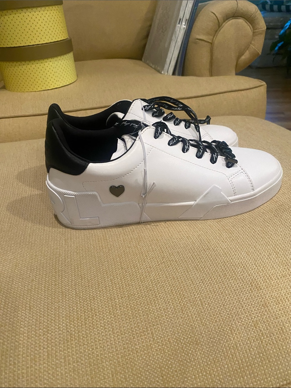 NWT Karl Lagerfeld White Sneakers with Black Accents says KARL on back.